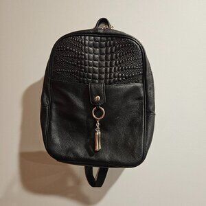Roma black backpack. Very roomy, zipper closure